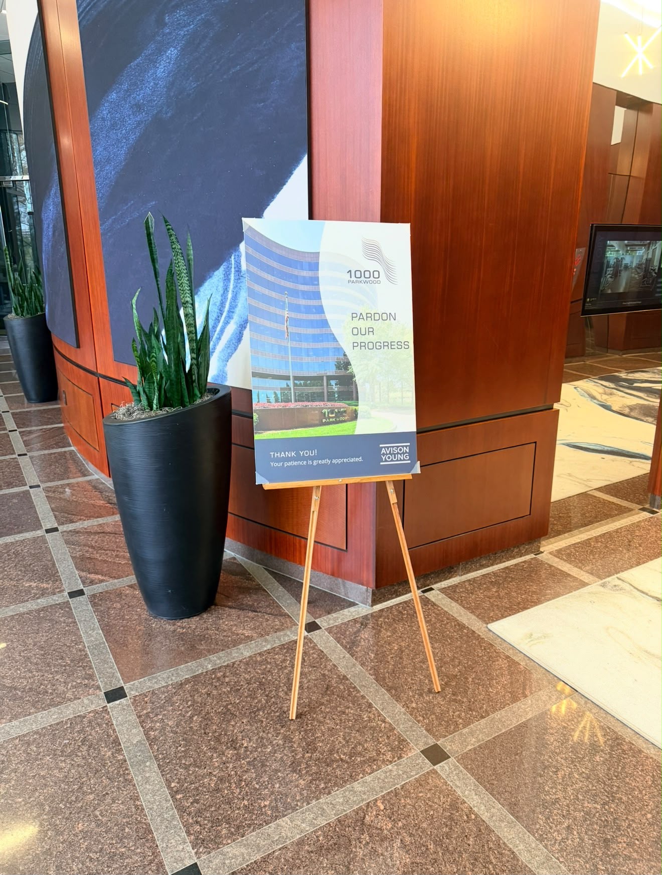 A printed board on an easel in the same lobby